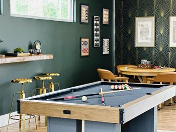 Large entertainment lounge with billiards and bar seating